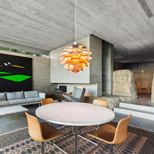 Load image into Gallery viewer, PH Artichoke Pendant Light in living room.

