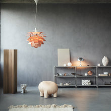 Load image into Gallery viewer, PH Artichoke Pendant Light in living room.
