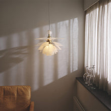 Load image into Gallery viewer, PH Septima Pendant Light in living room.
