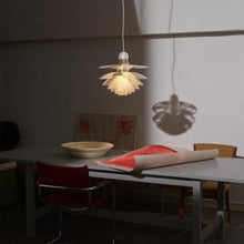 Load image into Gallery viewer, PH Septima Pendant Light in living room.
