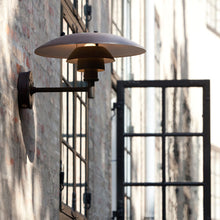 Load image into Gallery viewer, PH Wall Light in Outside Area.
