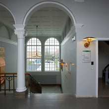 Load image into Gallery viewer, PH Wall Light in hallway.
