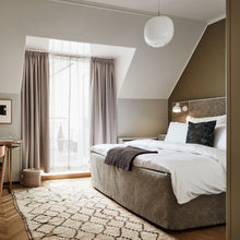 Load image into Gallery viewer, VL 38 LED Wall Light in Bedroom.
