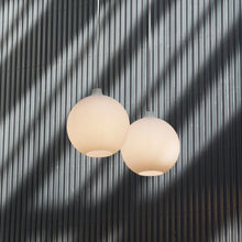 Load image into Gallery viewer, Wohlert Pendant Light in room.
