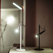 Load image into Gallery viewer, Magneto LED Table Lamp in living room.
