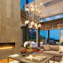 Load image into Gallery viewer, Majorette LED Pendant Light in living room.

