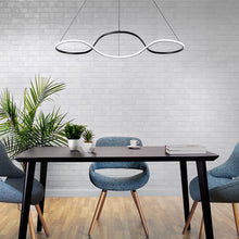 Load image into Gallery viewer, Marques LED Pendant Light in living room.
