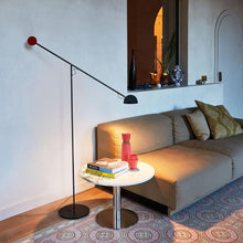 Load image into Gallery viewer, Copernica P LED Floor Lamp in living room.
