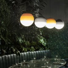 Load image into Gallery viewer, Dipping Light LED Pendant Light in living room.
