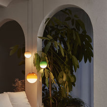 Load image into Gallery viewer, Dipping Light LED Pendant Light in living room.

