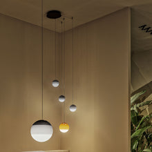 Load image into Gallery viewer, Dipping Light LED Pendant Light in living room.
