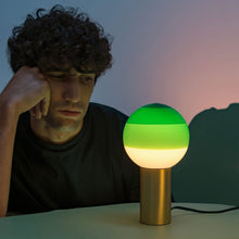 Load image into Gallery viewer, Dipping Light LED Table Lamp in living room.
