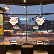 Load image into Gallery viewer, Discoco Pendant Light in living room.
