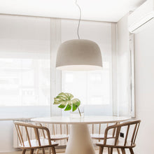 Load image into Gallery viewer, Djembe 65 LED Pendant Light in living room.
