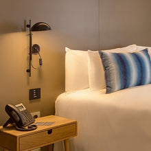 Load image into Gallery viewer, Funiculi A Wall Light in bedroom.
