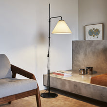 Load image into Gallery viewer, Funiculi Floor Lamp with Fabric Shade in living room.
