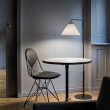 Load image into Gallery viewer, Funiculi Floor Lamp with Fabric Shade in living room.
