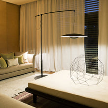Load image into Gallery viewer, Ginger LED Floor Lamp in living room.
