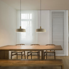 Load image into Gallery viewer, Soho LED Pendant Light in living room.
