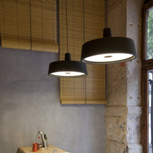 Load image into Gallery viewer, Soho LED Pendant Light in living room.
