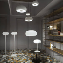 Load image into Gallery viewer, Vetra P LED Floor Lamp in living room.
