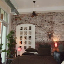 Load image into Gallery viewer, Bianca Direcional Ceiling Fan in living room.
