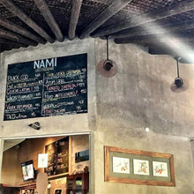 Load image into Gallery viewer, Bianca Direcional Ceiling Fan in restaurant.
