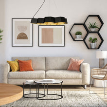 Load image into Gallery viewer, Honeycomb LED Chandelier in living room.
