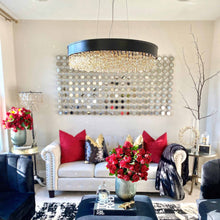 Load image into Gallery viewer, Mystic LED Pendant Light in living room.
