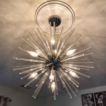 Load image into Gallery viewer, Polaris LED Pendant Light in living room.
