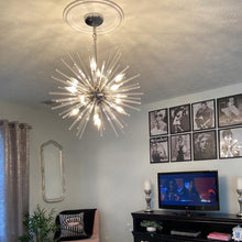 Load image into Gallery viewer, Polaris LED Pendant Light in living room.
