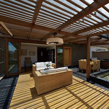 Load image into Gallery viewer, Tulum Outdoor LED Ceiling Fan in Outside Area.
