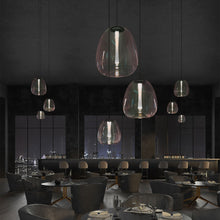 Load image into Gallery viewer, Mela™ LED Pendant Light in dining room.

