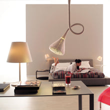Load image into Gallery viewer, Melampo Table Lamp in bedroom.
