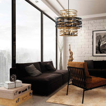 Load image into Gallery viewer, Vortic Flow Chandelier in living room.
