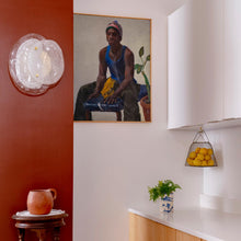 Load image into Gallery viewer, Celia LED Wall Light in living room.
