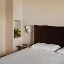 Load image into Gallery viewer, Leni Wall Light in bedroom.

