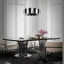 Load image into Gallery viewer, Chronos LED Pendant Light in living room.
