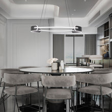 Load image into Gallery viewer, Ilios LED Chandelier in Dining Room.
