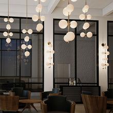 Load image into Gallery viewer, ModernRail LED Wall Light in restaurant.

