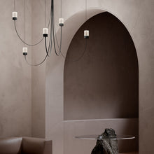 Load image into Gallery viewer, Gravity LED Chandelier in exhibition.
