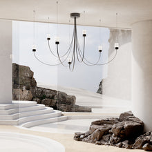 Load image into Gallery viewer, Gravity LED Chandelier in exhibition.
