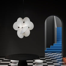 Load image into Gallery viewer, Serpentine Pendant Light in exhibition.
