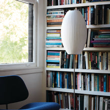 Load image into Gallery viewer, Nelson® Cigar Lotus Floor Lamp In Use
