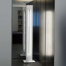 Load image into Gallery viewer, Ara LED Floor Lamp in living room.
