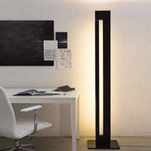 Load image into Gallery viewer, Ara LED Floor Lamp in living room.
