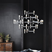 Load image into Gallery viewer, Crown Major LED Pendant Light in living room.
