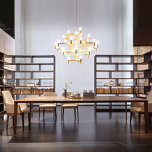 Load image into Gallery viewer, Crown Major LED Pendant Light in living room.
