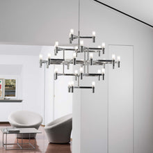 Load image into Gallery viewer, Crown Major LED Pendant Light in living room.
