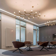 Load image into Gallery viewer, Crown Plana Mega Pendant Light in living room.
